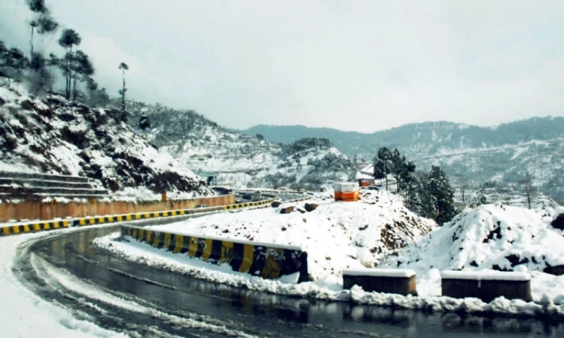 an image of murree's mountains and roads which are covered with snow